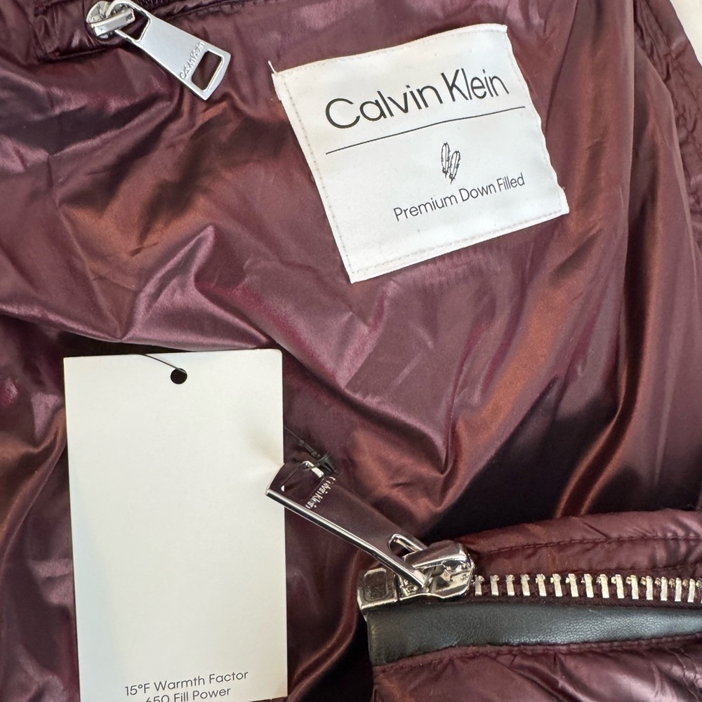 Calvin Klein Shiny Deep Burgundy Down Jacket with Silver Hardware